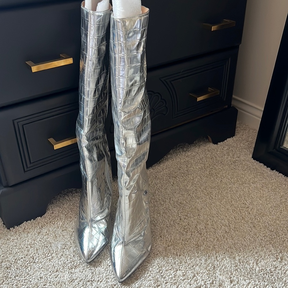 Knee high silver boots